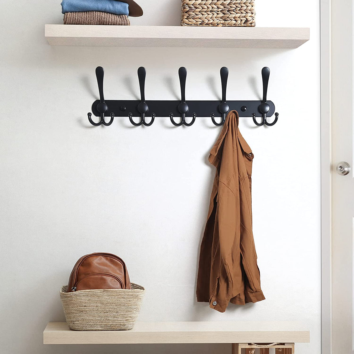 The black finish against a white wall