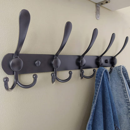 A single triple hook holding a heavy winter coat