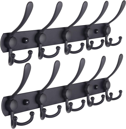 Black steel coat rack with five triple hooks mounted in a hallway