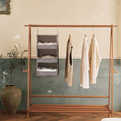 Folded jumpers stored on the shelves